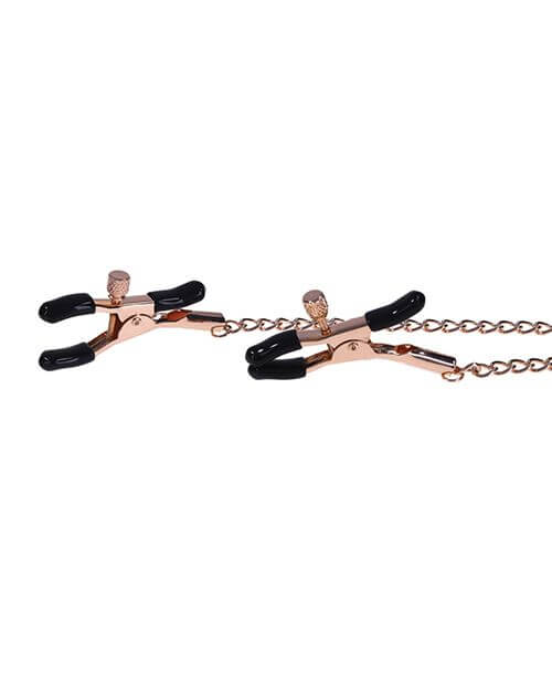 Close-up on the tips of the Sportsheets Brat Charmed Nipple Clamps themselves. They're alligator-style clamps with small screws that allow for customized adjustment of the tightness of the clamps. | Kinkly Shop