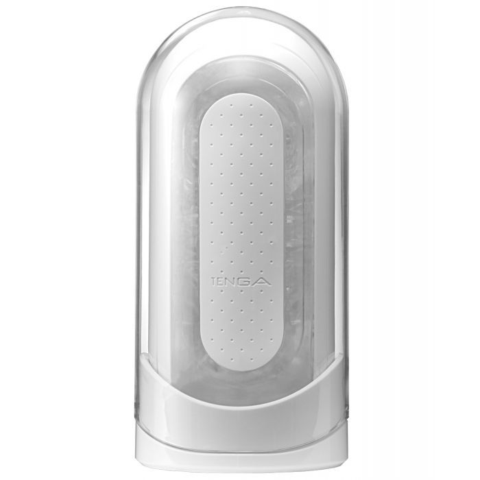 The Tenga Flip Zero in white shown within its storage case and packaging. | Kinkly Shop