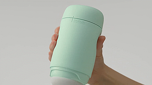 GIF shows a hand stroking the Tenga Puffy sleeve up and down a glass probe. | Kinkly Shop