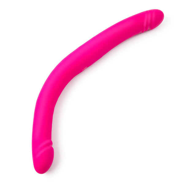 The Together Toy Duo Together bent into a slightly curved line. This would allow two people to lay on their backs or fronts while sharing the dildo between the two of them. | Kinkly Shop