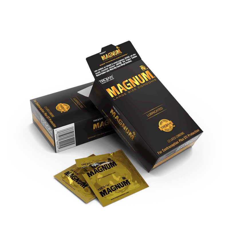 One of the 12 pack boxes of Trojan Magnum Condoms is open. A few of the individually wrapped condoms sit out next to the Magnum box, showcasing what the condoms look like individually. They're a bright gold. | Kinkly Shop