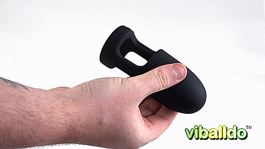 A person's hand is handling the ViBalldo while it vibrates. The silicone jiggles as the person twists the toy this way and that to showcase the size of the toy while handled. | Kinkly Shop