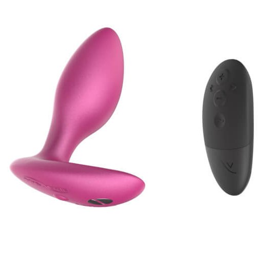 We-Vibe Ditto+ in Cosmic Pink next to the remote in front of a white background | Kinkly Shop