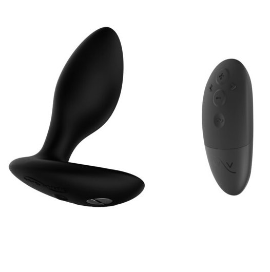 We-Vibe Ditto+ in Satin Black in front of a white background next to the remote. | Kinkly Shop