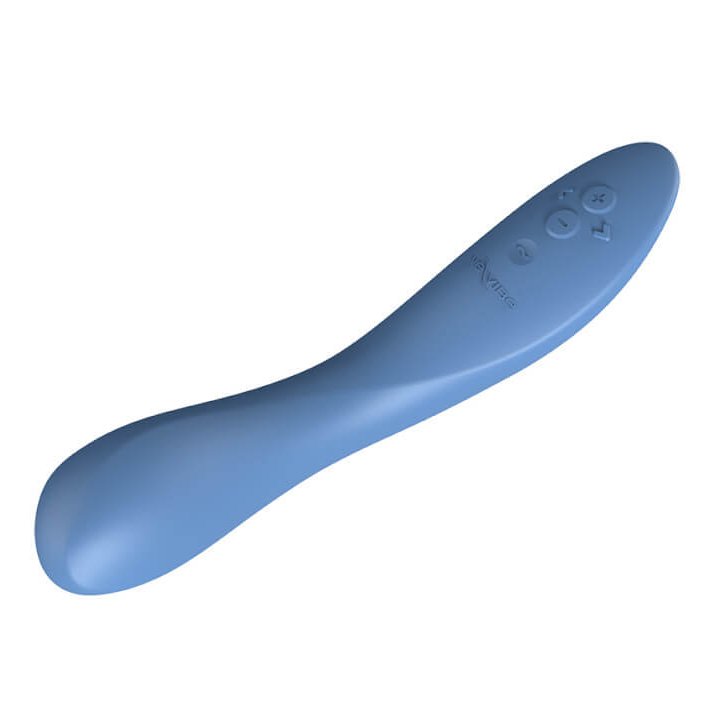 The We-Vibe Rave 2 rests in front of a white background, showcasing the unique asymmetrical shape of the toy. The head is broad and curved, offering a wide surface to snuggle up against the g-spot. | Kinkly Shop