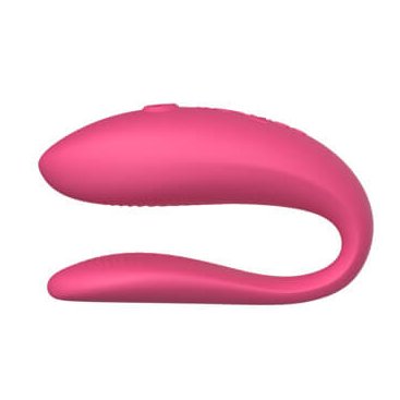 A side profile of the We-Vibe Sync Lite in Pink. The top, clitoral end is much thicker than the end that gets inserted in the vagina. The insertable g-spot end is much slimmer and looks flat. There's a slight texturing on the interior of both sides. | Kinkly Shop