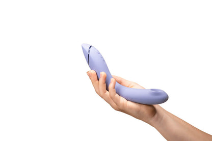 A hand holds the Womanizer OG. The toy is much longer than the person's outstretched palm, showcasing the length of the toy to be able to easily nestle it up against the G-spot inside. | Kinkly Shop