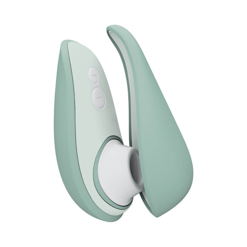 Womanizer Liberty 2 in Sage up against a plain white background | Kinkly Shop