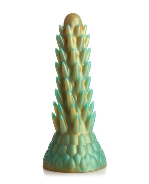 The Creative Cocks Stegosaurus in front of a plain white background. The dildo is a green/yellow blend of color with a lot of "spikes" protruding from the entire length of the Creative Cocks Stegosaurus | Kinkly Shop