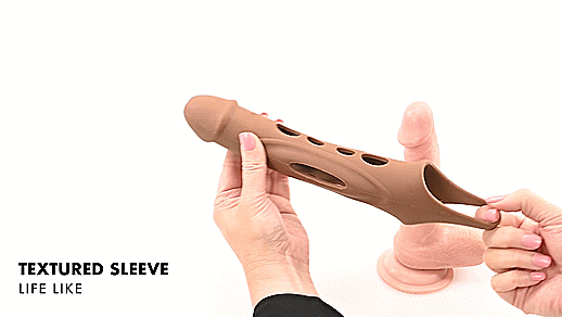 GIF shows a person's two hands handling and touching the Evolved Big Shaft Extender. They stretch out the testicle loop, shaft of the toy, and the tip to showcase how stretchy the material is. The text reads: "Textured sleeve. Life like." | Kinkly Shop