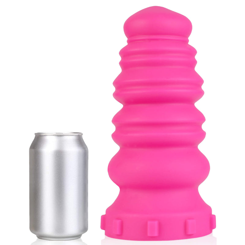 The Extra-Large 665 Macarons Dildo dildo sitting on a white background next to a soda can. The dildo looks huge next to the can. | Kinkly Shop