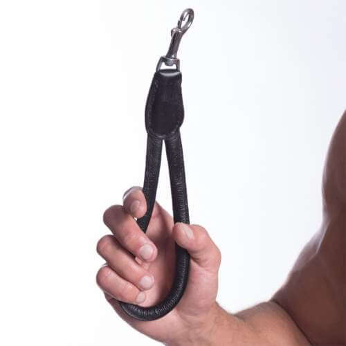 A person holds the 665 Short Leash. Instead of holding it by the loop, they have their entire hand wrapped around the entire loop of the leash. Despite looking like they're trying to squeeze the loop of the leash together, the 665 Short Leash still maintains a loop-like appearance. | Kinkly Shop