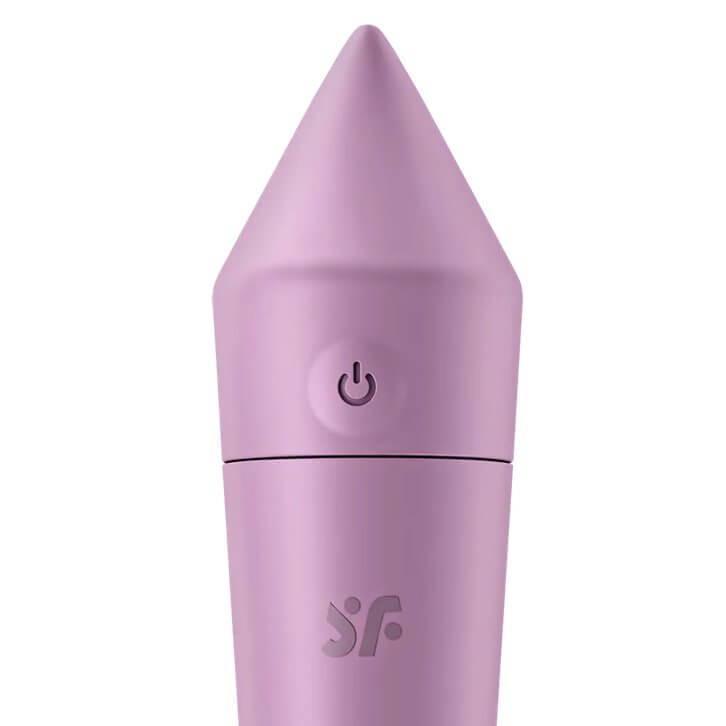 Close-up of the tip of the Satisfyer Ultra Power Bullet 8. The close-up shows the raised edge of the power button as well as the SF of the Satisfyer logo. The tip of the vibrator has a pointed, arrowhead-like design. | Kinkly Shop