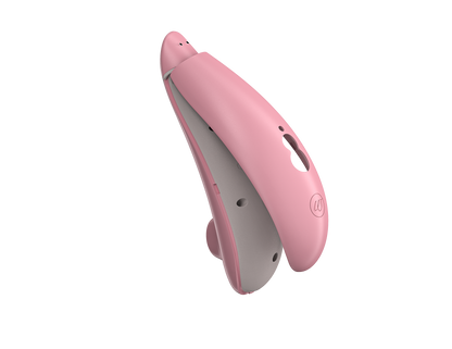 Image shows the back cover being easily removed from the Womanizer Premium Eco Friendly Vibrator. This is something this vibrator can do to make for easy replacement of the battery and easy recycling at the vibrator's end of life. | Kinkly Shop