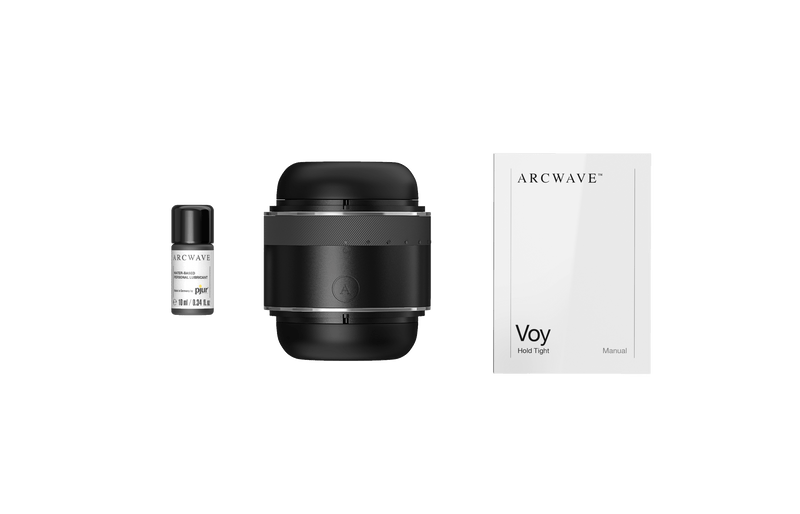 Everything that's included with the Arcwave Voy including a sample-size of lube, the Voy itself, and the instruction manual. | Kinkly Shop