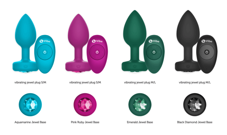All four versions of the b-Vibe Vibrating Jewel Remote Control Butt Plug lined up next to one another. This allows you to compare colors and sizes. It shows the plug itself, the remote, and an angle that shows off the gem at the base. | Kinkly Shop