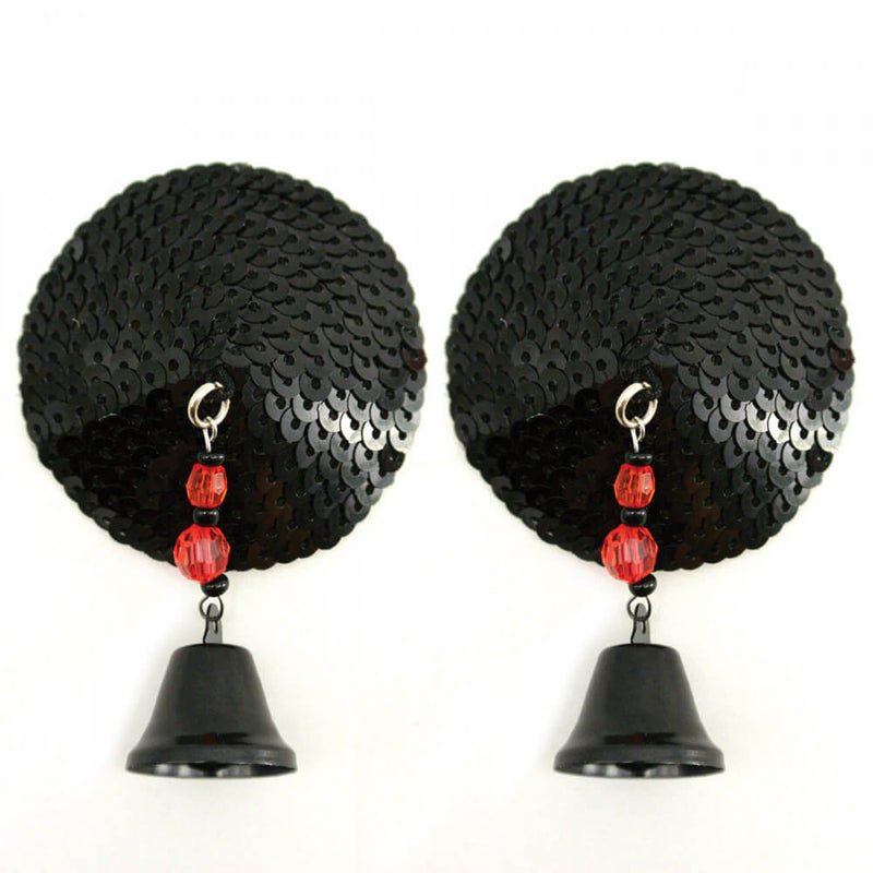 Bijoux de Nip Sequin Pasties with Bells in front of a white background. The pasties themselves are completely covered with black sequins. Hanging off of each pastie is a black, jingling bell underneath a few red and black beads. | Kinkly Shop