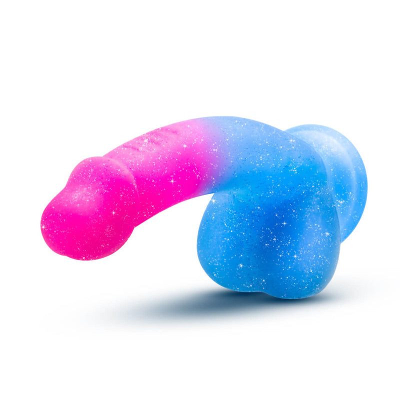 Blush Avant Chasing Sunsets dildo as-if it was pressed up against a wall with the suction cup. This showcases the downward, 'natural' angle of the dildo alongside the pronounced, circumsized head. | Kinkly Shop