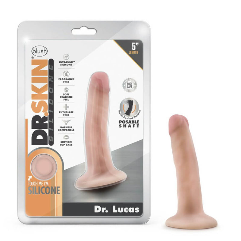 Blister pack packaging for the Blush Dr. Skin Lucas dildo located next to the dildo itself. | Kinkly Shop