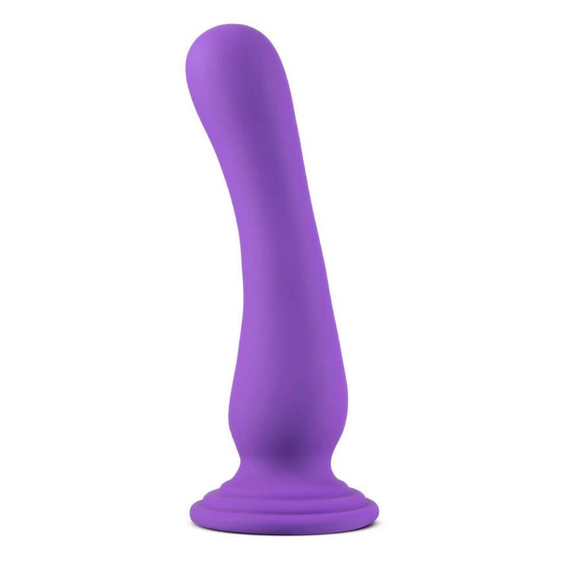 Side view of the Blush Impressions Ibiza. The dildo is clearly curved towards one side for a curved tip that provides g-spot and p-spot stimulation. | Kinkly Shop