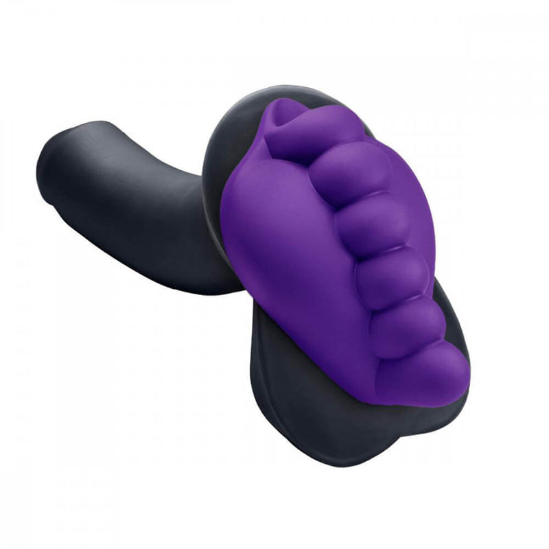 Another example image of how the Honeybunch Dildo Base Attachment for Pegging Pleasure presses up against dildos. This dildo is a semi-realistic dildo that features testicles at the base. The Honeybunch can stick onto this dildo as well. | Kinkly Shop