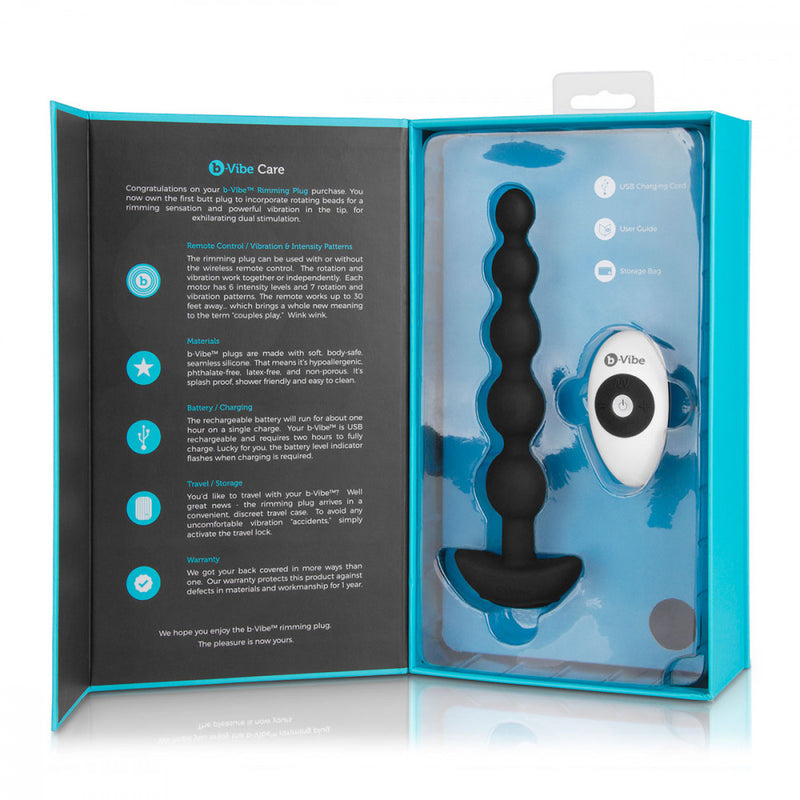 Packaging of the b-Vibe Cinco Remote Control Rechargeable Beads that shows the open-door design with a plastic tray that holds the items. | Kinkly Shop
