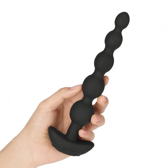 A hand holds the b-Vibe Cinco Remote Control Rechargeable Beads to show its long length | Kinkly Shop