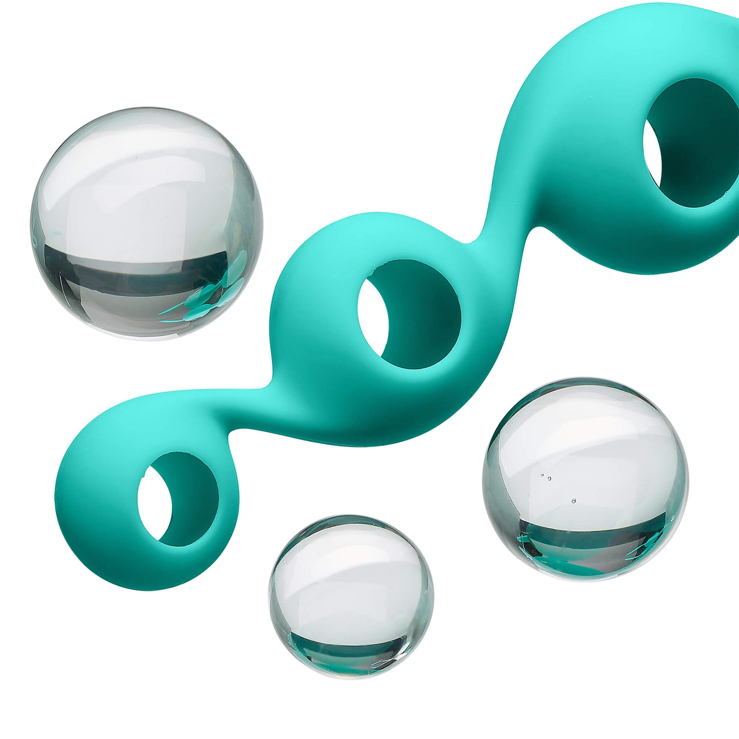 Image shows the glass Kegel balls popped out of the 3-ball silicone sleeve. You can see that the silicone sleeve of the Cloud 9 Borosilicate Kegel Training Set is hollow. | Kinkly Shop