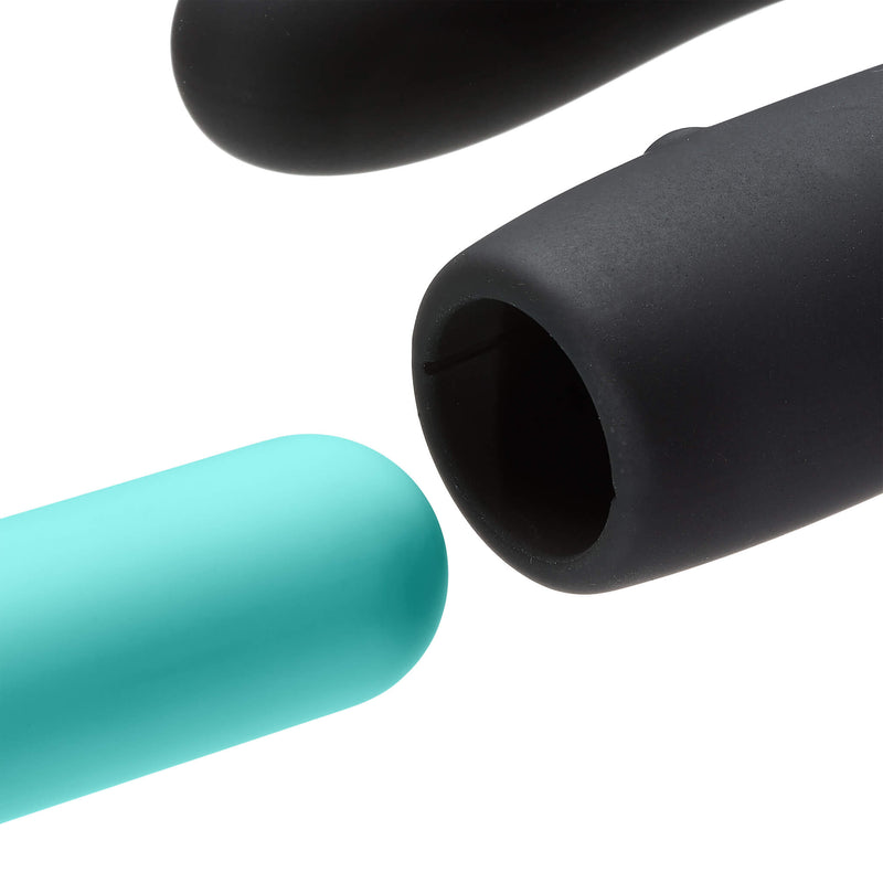 Close-up image shows the Cloud 9 Rocker Prostate Stimulator bullet vibrator about to slide into the silicone sheath of the prostate Rocker. This makes it obvious that the two pieces are separate and can come apart when you want them to. | Kinkly Shop