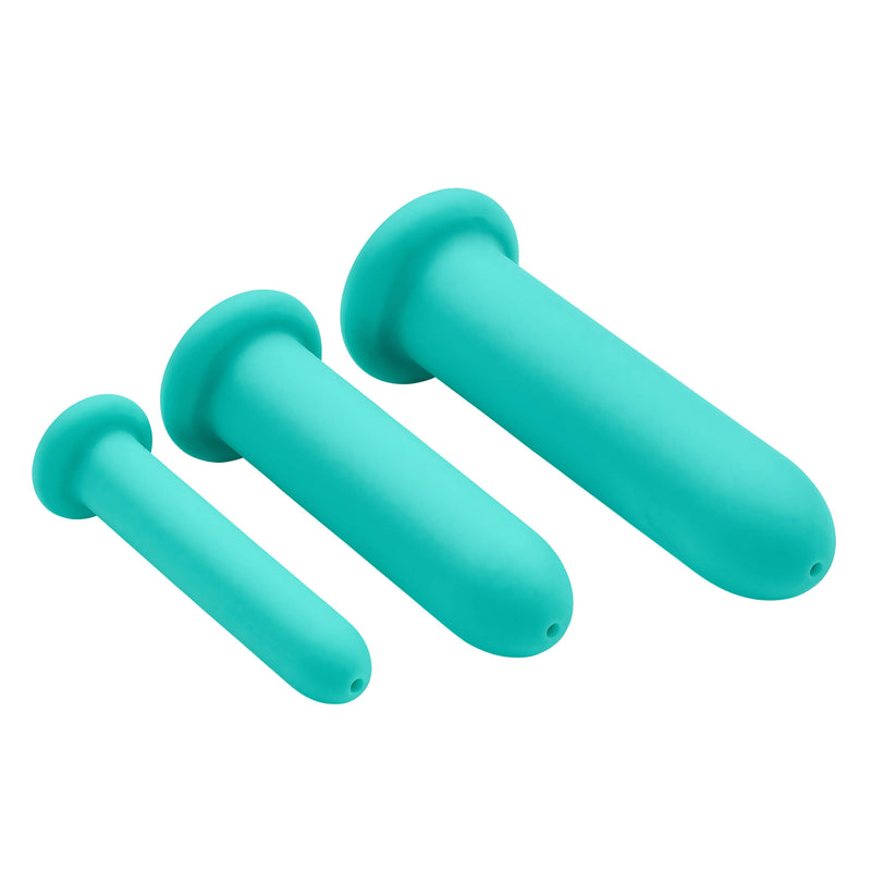 All of the dilators in the Cloud 9 Silicone Anal Dilator Kit and Vaginal Dilator Kit are laid on their side. You can see the flared base (which makes them safe for anal use!) as well as the hollow, open tip that works for the lubricant channel. | Kinkly Shop