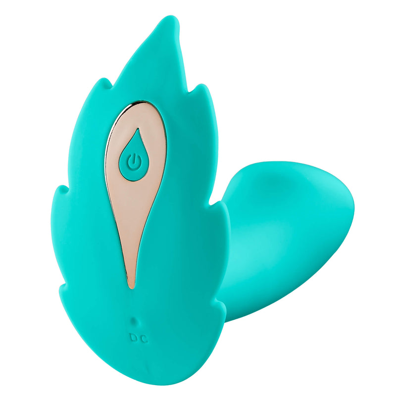 Close-up detail shot of the leaf detailing on the base of the Cloud 9 Wireless Remote Control Panty Leaf Vibe. You can clearly see the curved edges and the Power button. | Kinkly Shop