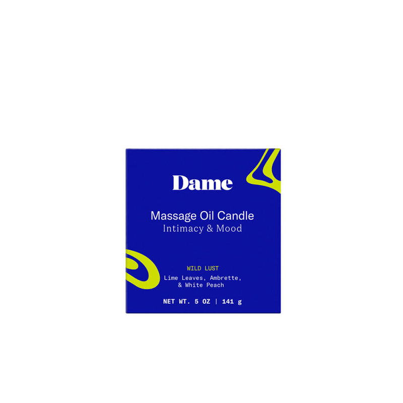 Packaging for the Dame Massage Oil Candle. It's a royal blue, rectangular box that contains the candle within it. | Kinkly Shop