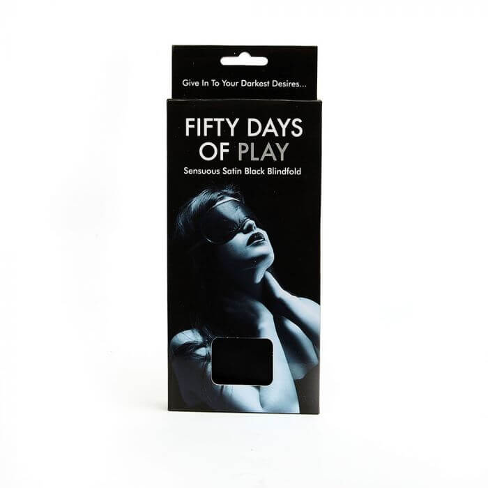 Packaging for the blindfold included in the Fifty Days of Play Bondage Bundle. It has the Fifty Shades of Grey packaging that showcases Anastasia Steele on the front. | Kinkly Shop