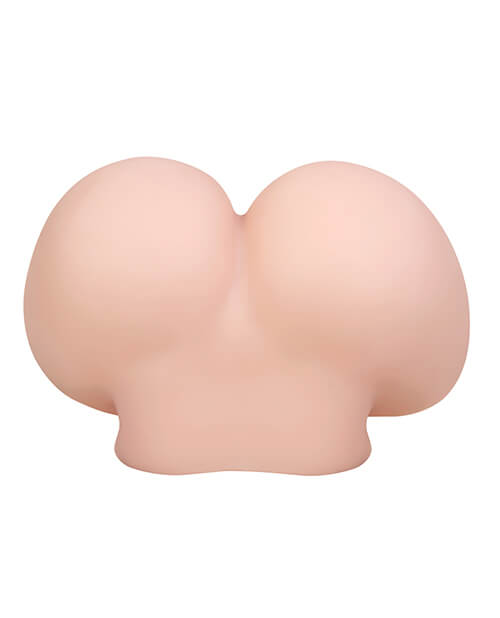 A top-down view of the Gender X A Handful as it sits on a surface. This showcases the very large, bubble-butt appearance of the backside as well as the spot on the torso where the mini sex doll stops. | Kinkly Shop