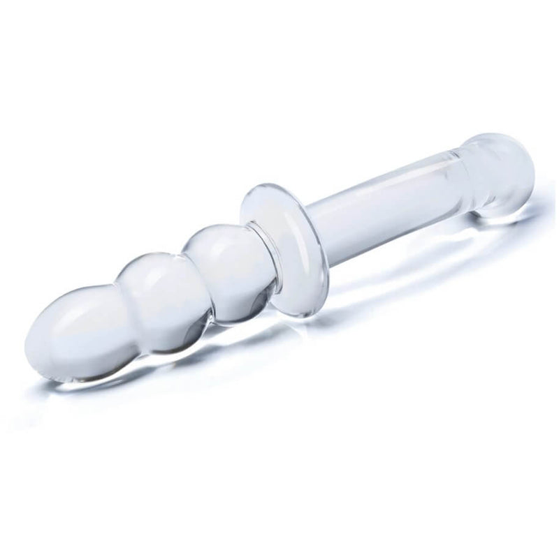 Close-up on the handle end of the 8" Glass Ribbed G-Spot dildo. This showcases the distinct "bulbs" of the handle as well as the large, protruding midline of the dildo that helps make for an easier grip. | Kinkly Shop