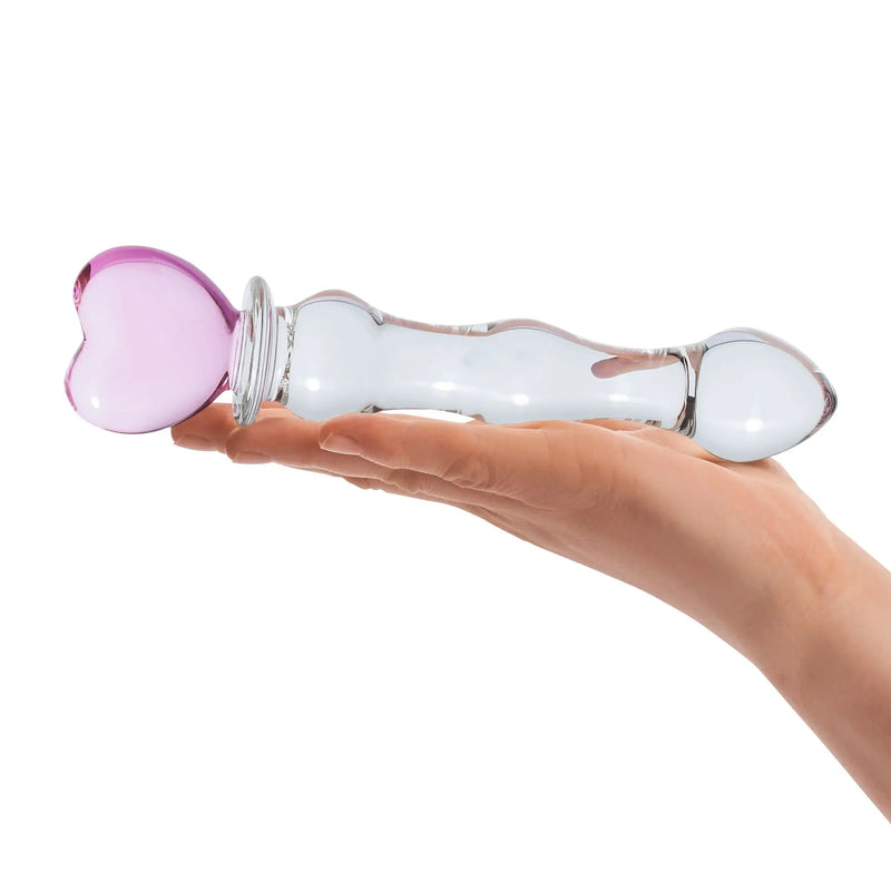 A flat hand holds the 8" Sweetheart Glass Dildo. The dildo is much longer than the person's palm and clearly much thicker than a single finger. | Kinkly Shop
