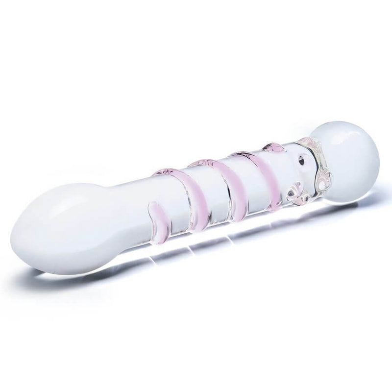 A 3/4th angle showing the Spiral Staircase glass dildo. This angle showcases the protruding spiral along the shaft as well as the tapered tip of one end and the ball-like tip of the opposing end. | Kinkly Shop