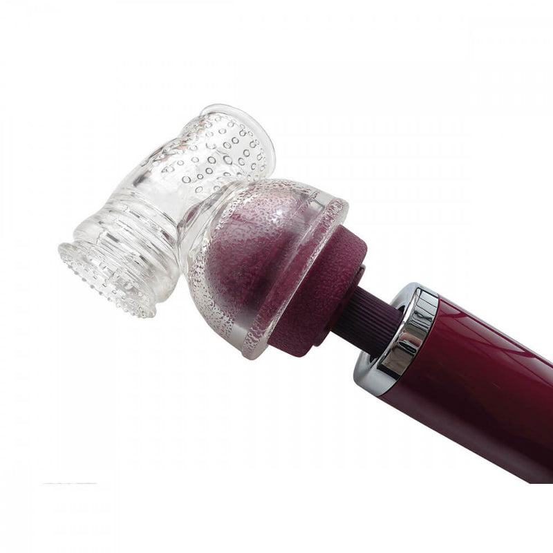 The Kinklab Hammerhead situated on top of the Kinklab VibeRight massager. It has a see through "cap" that shows the wand massager underneath the attachment, and the tube of the Kinklab Hammerhead sticks out off the top of the wand massager. | Kinkly Shop