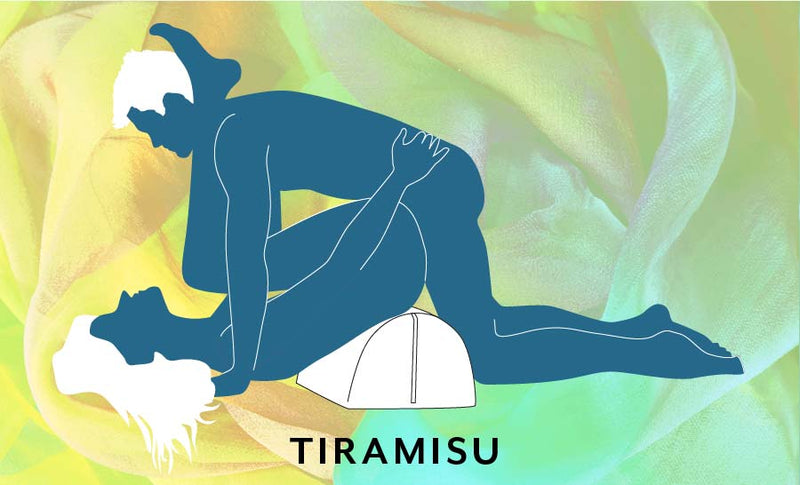 An illustrated sex position called the Tiramisu that shows the receptive partner laying down on the ground with their hips very elevated by the Liberator BonBon Sex Toy Mount while the penetrating partner enters them while leaning on top of them | Kinkly Shop