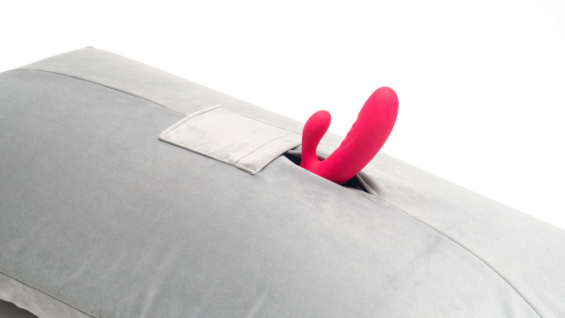 A close-up of a rabbit vibrator stuffed deep into the Liberator Humphrey. | Kinkly Shop