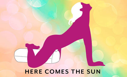 Illustrated sex position. Titled "Here Comes the Sun". The Liberator Wing has a powerful vibrator slipped into it. A person is straddling the Wing with between their thighs pressed firmly into the shape as it vibrates. | Kinkly Shop