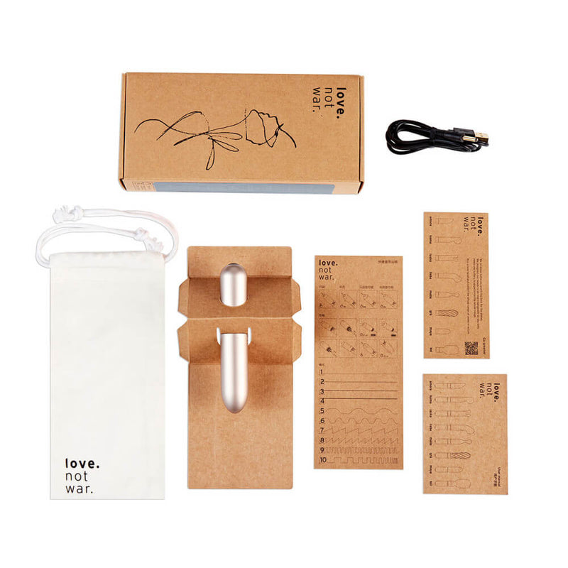 Everything that comes with the Love Not War Maya. The packaging is extremely cardboard-heavy with the box, stabilizer, and instructions all made from recyclable cardboard. The Love Not War Maya also includes a cotton drawstring storage bag and a charging cable. | Kinkly Shop
