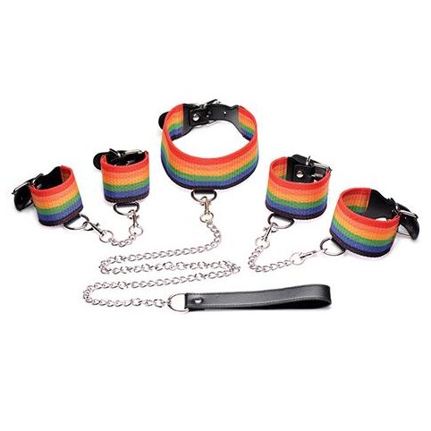 The pride bondage set sits out on a flat surface to display the leash and chains that connect the rainbow bdsm toys in the Master Series Kinky Pride Rainbow Bondage Set | Kinkly Shop