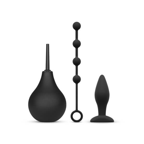 Everything included in the Nexus Beginner Anal Kit. It shows the enema bulb, anal beads, and small anal plug. | Kinkly Shop