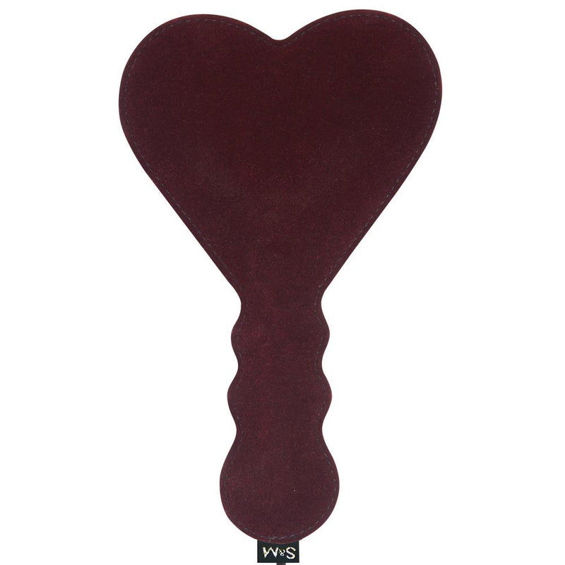 The backside of the Sportsheets Enchanted Heart Paddle shows that it's a super-smooth, suede side with no additional faux fur. The smooth side will provide much more of a stingy spanking experience. | Kinkly Shop