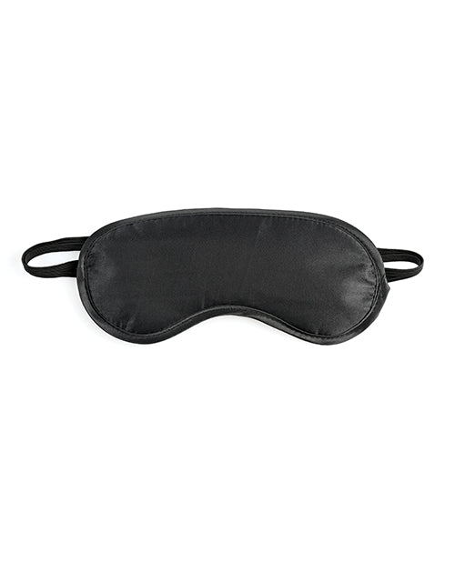 The Sportsheets Cuffs and Blindfold Set blindfold is sitting in front of a white background. It looks like a standard, nondescript blindfold that could work great for non-sexual uses as well. The satin blindfold is held on the head by a single, thin strap of elastic. | Kinkly Shop