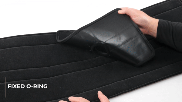 GIF shows two hands inserting a dildo into the dildo attachment pad that's attached to the seat of the Sportsheets Door Jam Sex Sling Special Edition plus size sex swing. It shows how modular the design is - and how movable and interchangeable the dildo pad attachment design is. | Kinkly Shop