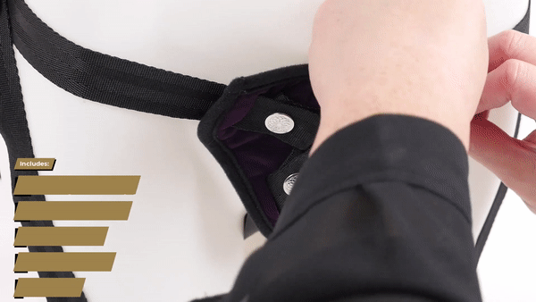 GIF shows a person unsnapping one of the snap buckles that holds the O-ring in place. Repeat this process four times to change out the O-rings for one of the other O-rings included in the Sportsheets Lush Purple Strap On. | Kinkly Shop