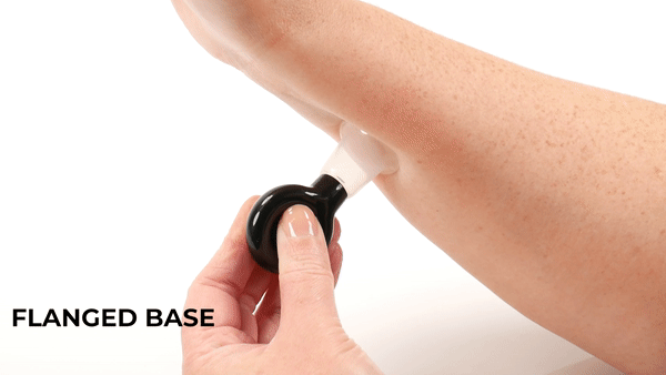 GIF shows a person suctioning the Nipple Suckers onto their wrist. The GIF clearly shows how much skin is pulled into the Sucker when it's fastened onto the skin. The text says "Flanged Base for More Secure Suction". | Kinkly Shop