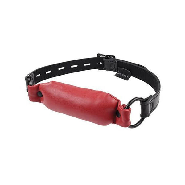 Sportsheets Saffron Soft Bit Gag up against a white background. The red gag portion looks extremely soft and pillowy like a literal pillow for your mouth. | Kinkly Shop